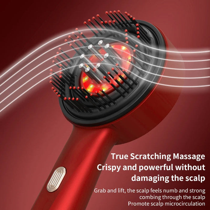 Close-up of massage comb head with red light