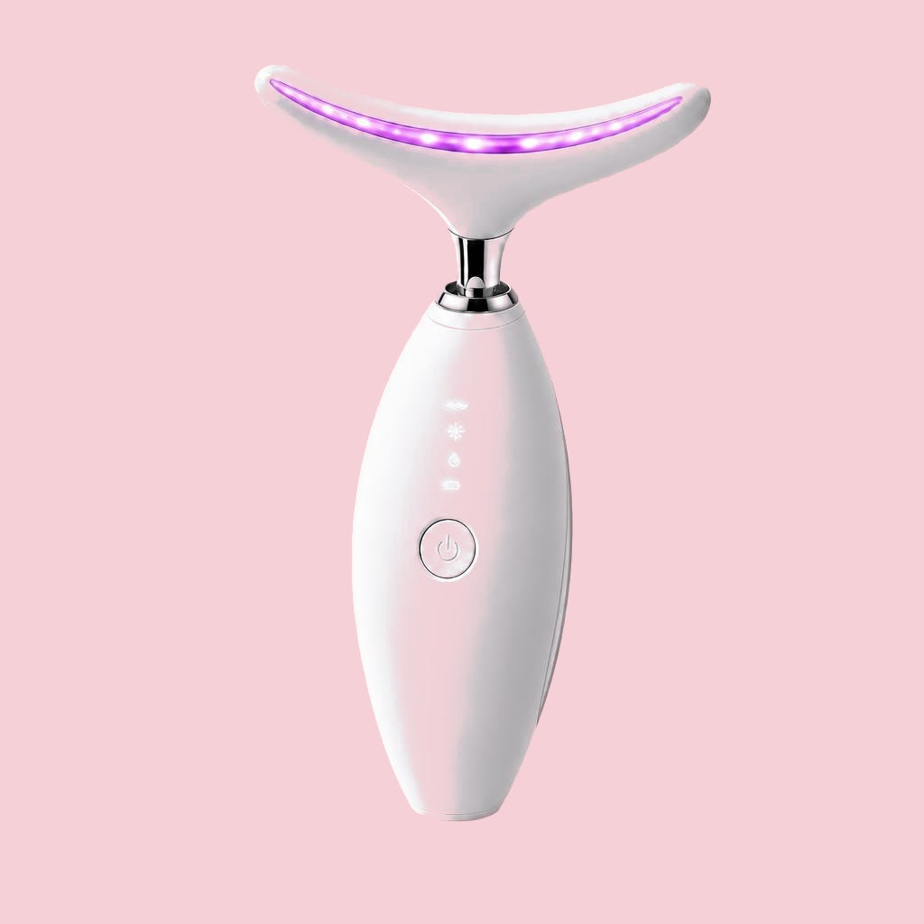 Facial Massager with purple LED light, studio shot