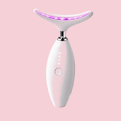Facial Massager with purple LED light, studio shot